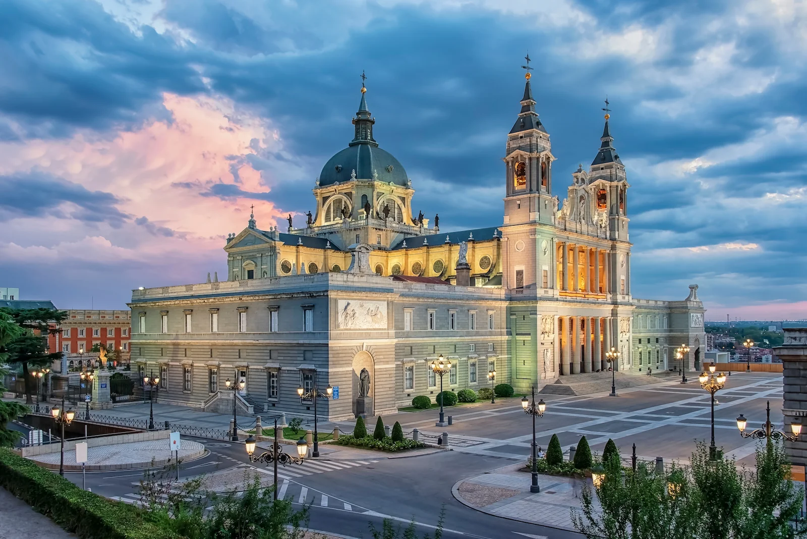 The Royal Palace and Almudena Cathedral in Madrid at dusk