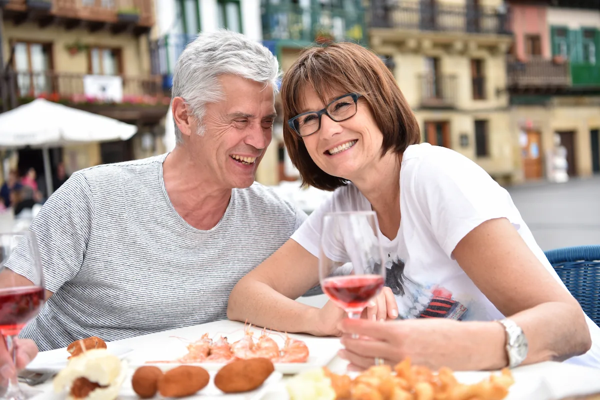 Couple at a sidewalk tapas bar, Madrid